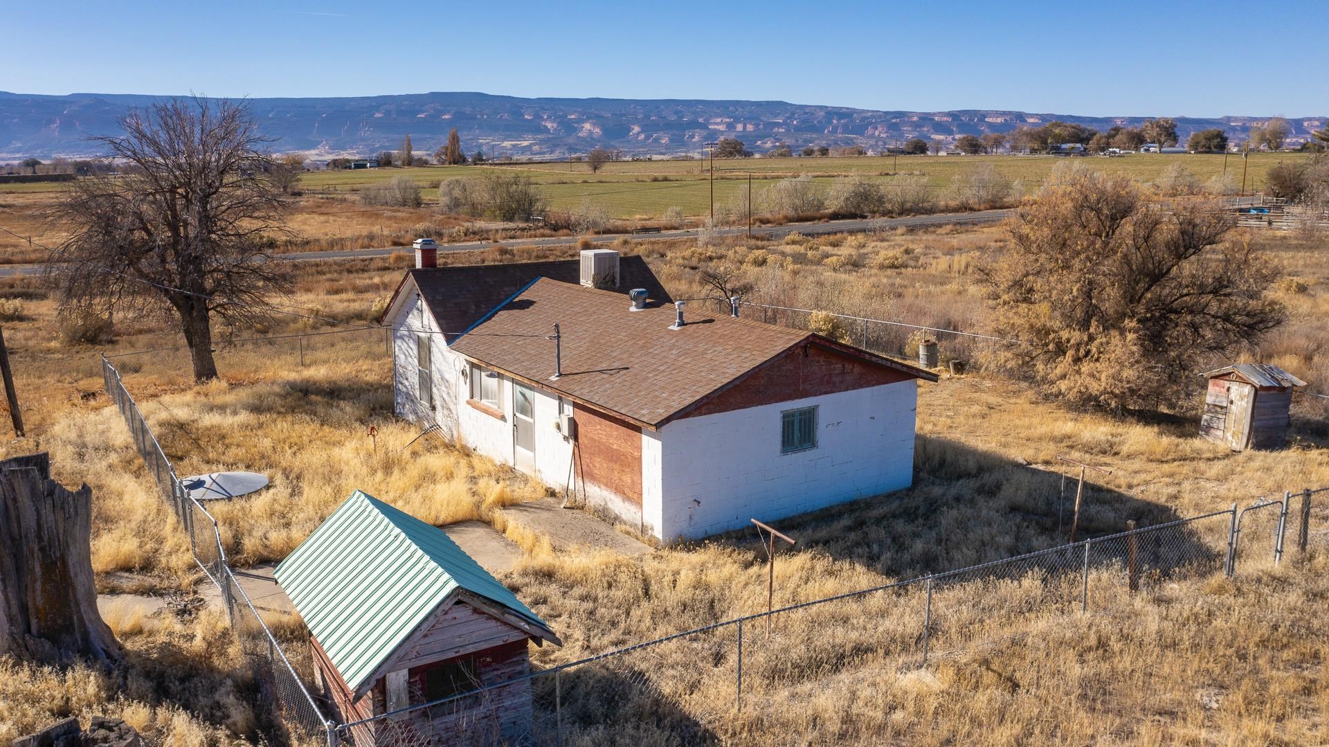 1688 M Road Fruita, CO 81521 - Photo 29 of 33 an aerial view of a house with a yard