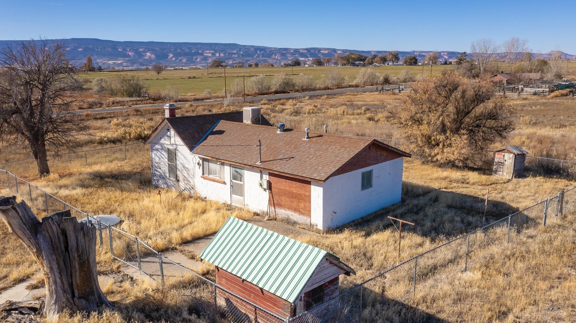 1688 M Road Fruita, CO 81521 - Photo 30 of 33 an aerial view of a house with a yard