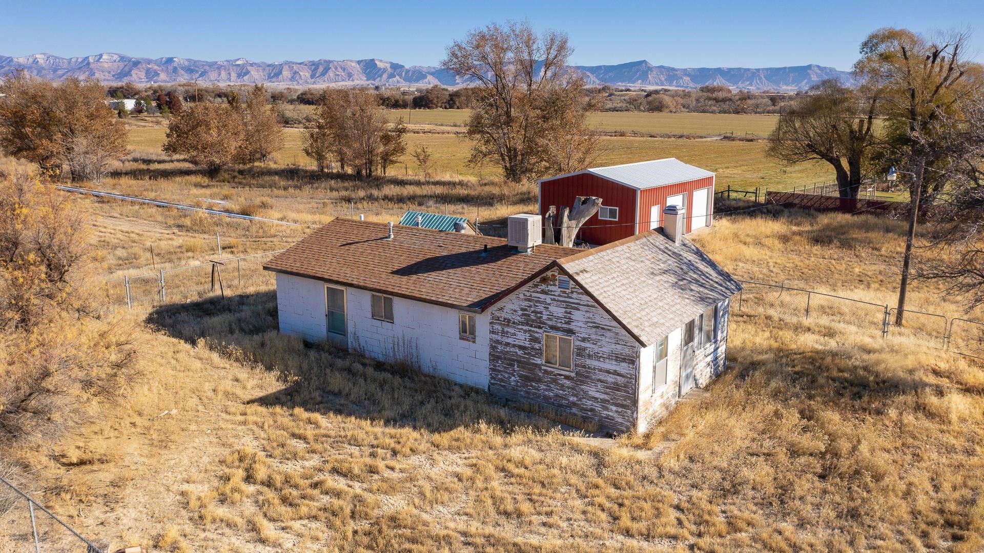 1688 M Road Fruita, CO 81521 - Photo 31 of 33 a view of a house with a yard
