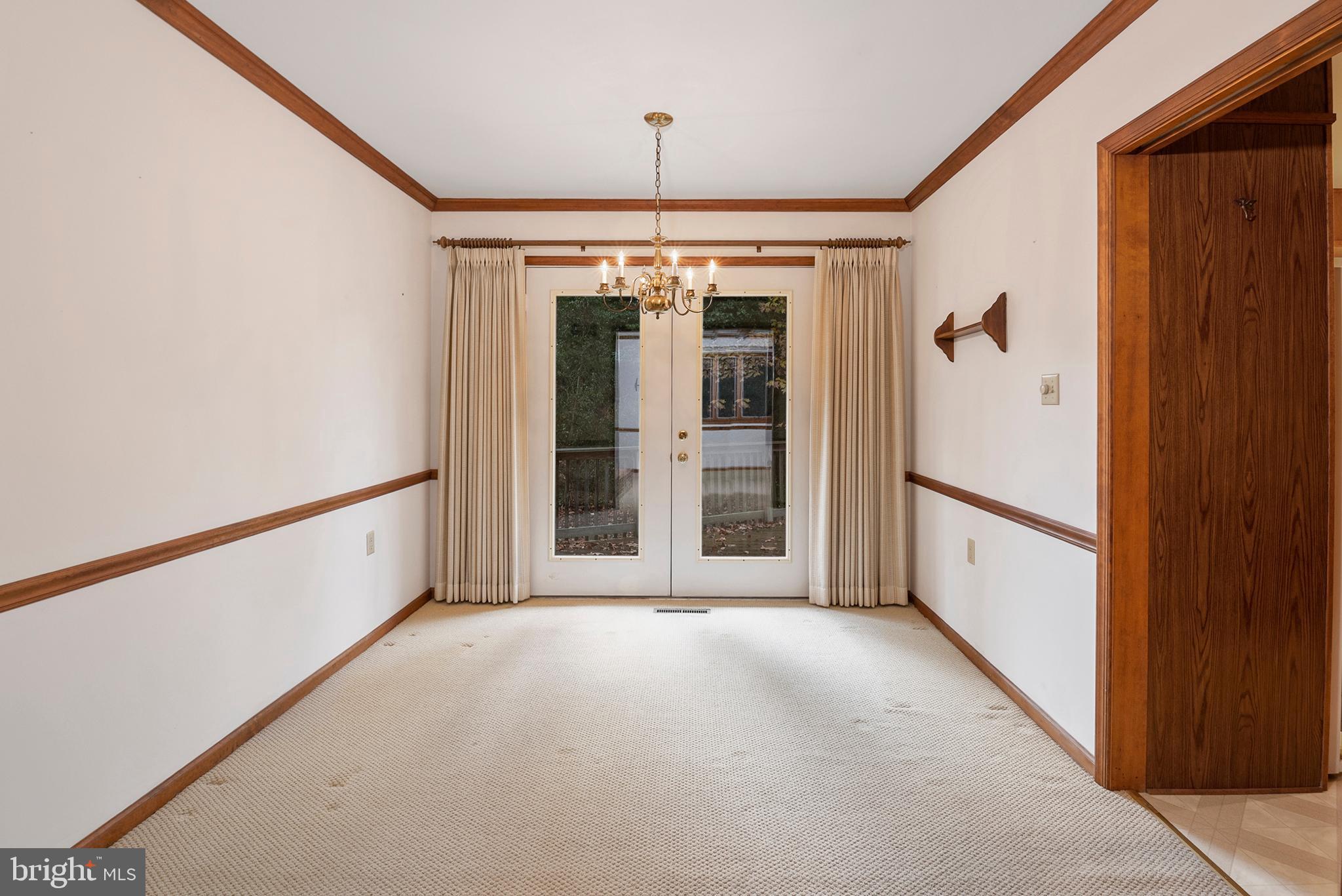 40 Jenkins Road Chesapeake City, MD 21915 - Photo 8 of 34 Ding Room, open to rear deck