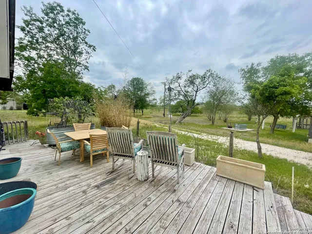 a view of a backyard with pathway