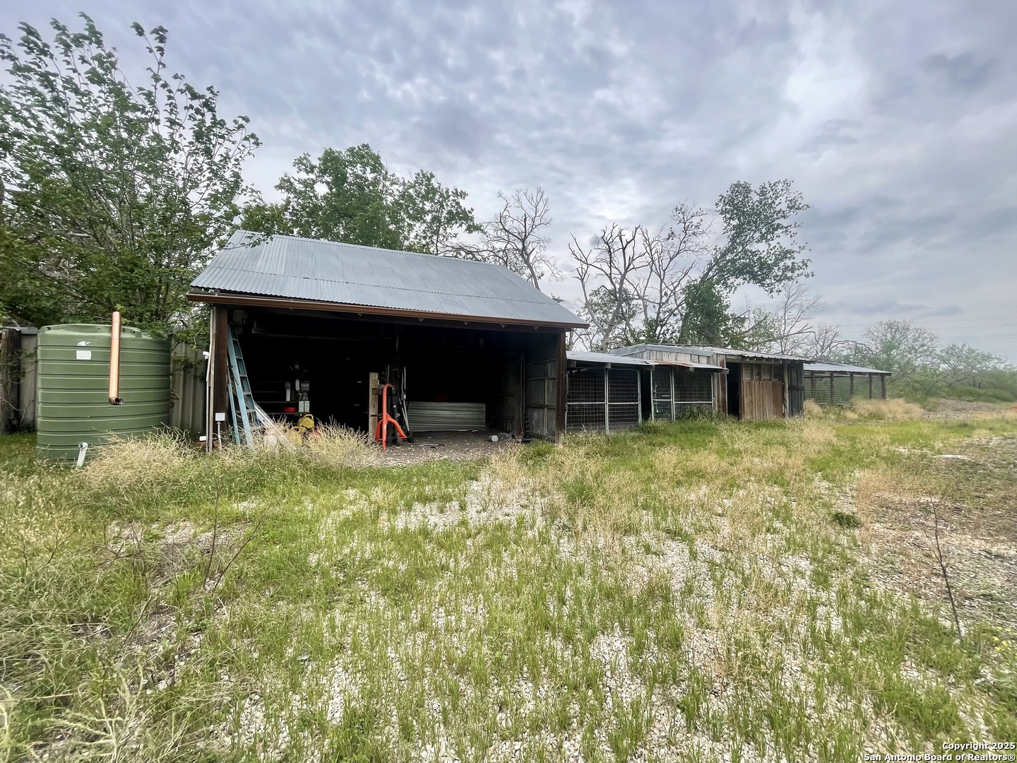 2230 Weil Road Marion, TX 78124 - Photo 16 of 21 a view of a house with a yard balcony and tree