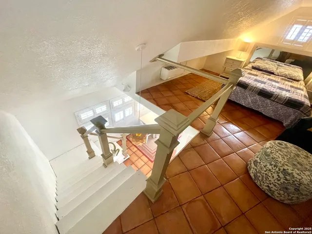 a living room with a rug