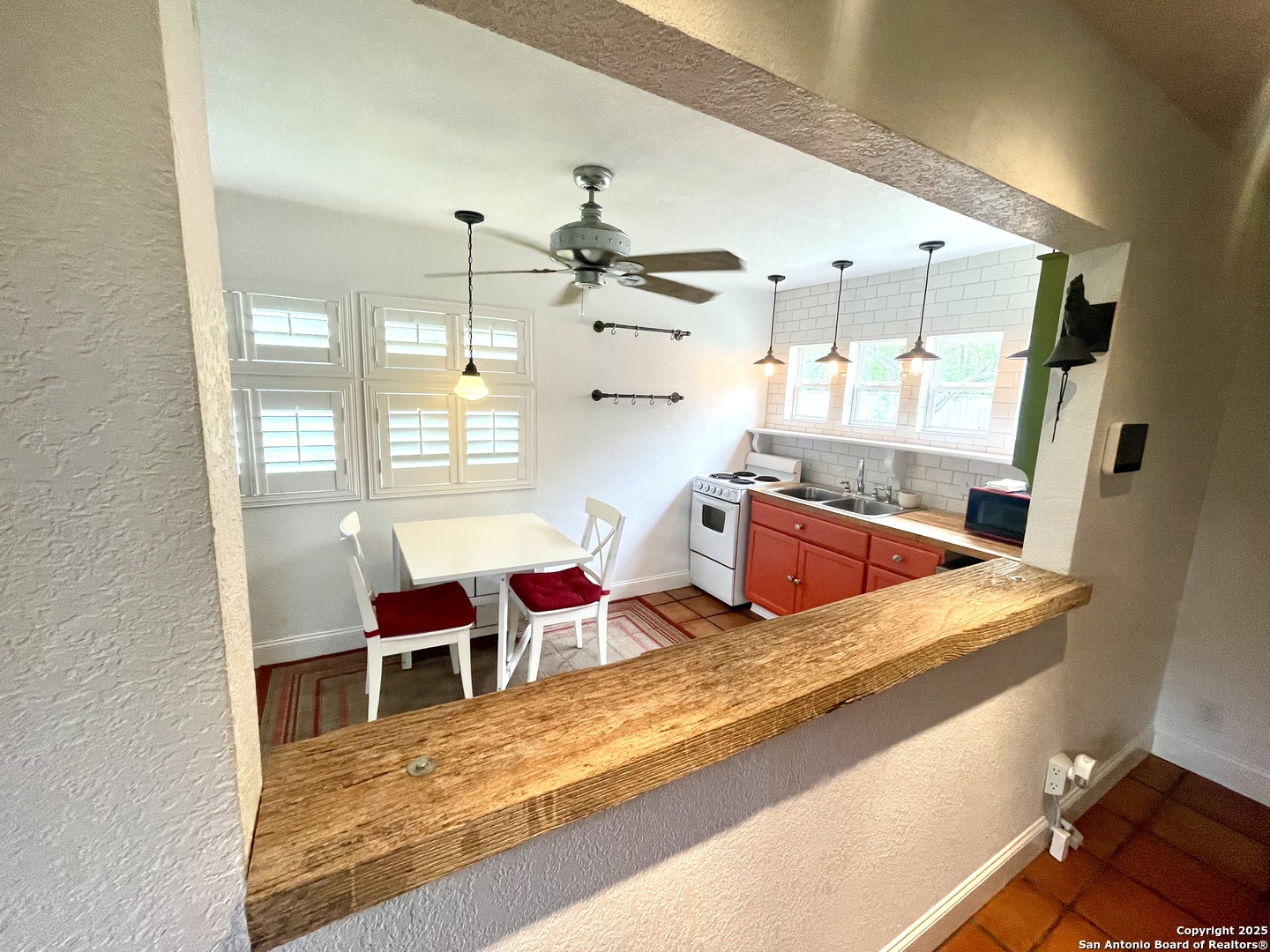2230 Weil Road Marion, TX 78124 - Photo 8 of 21 a room with stainless steel appliances kitchen island granite countertop wooden cabinets and white stove top oven