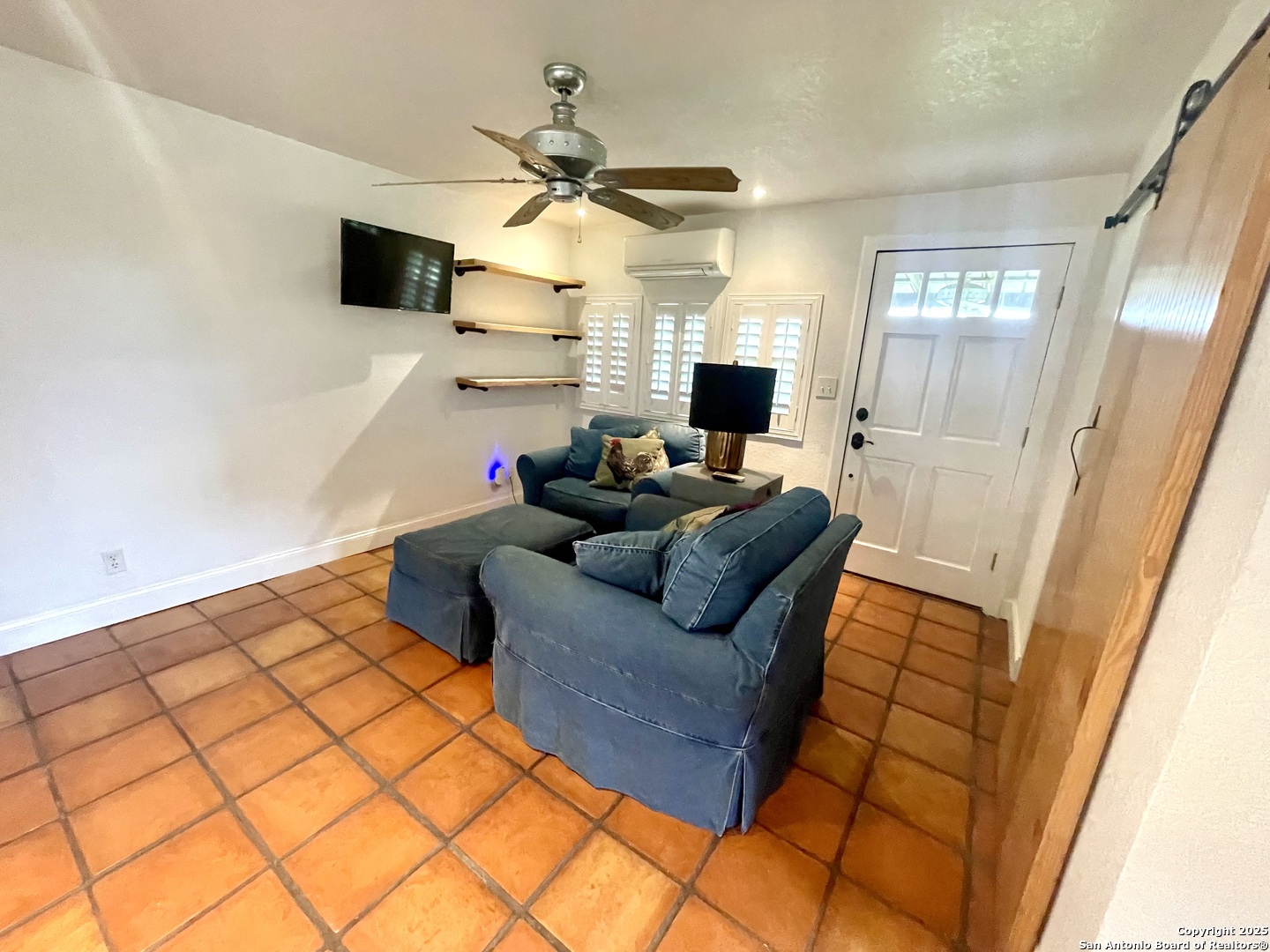 2230 Weil Road Marion, TX 78124 - Photo 9 of 21 a living room with furniture and a flat screen tv