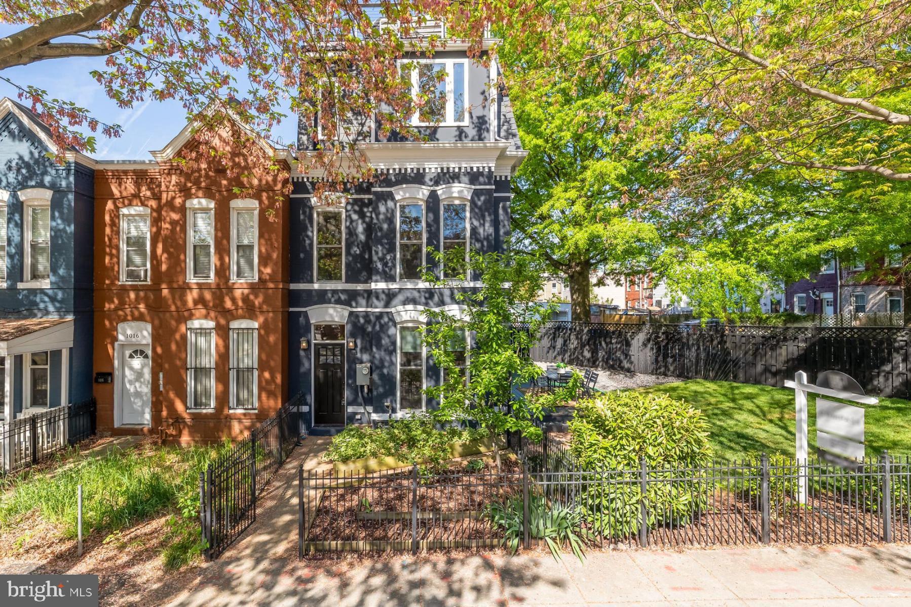 1018 9th Street Northeast Washington, DC 20002 - Photo 1 of 1 a view of a house with a small yard and plants