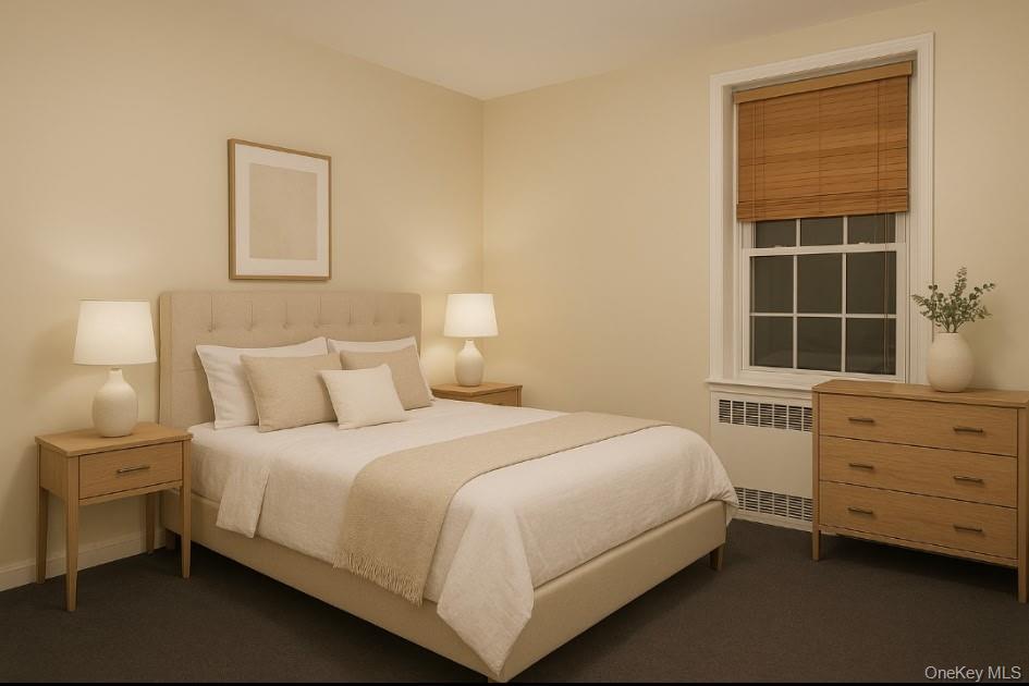 760 Bronx River Road, Unit A65 Bronxville, NY 10708 - Photo 7 of 7 2nd Bedroom featuring radiator heating unit and dark carpet.Virtually staged