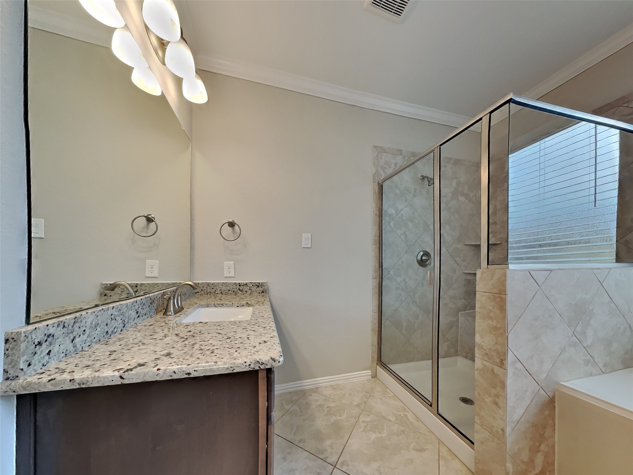 3434 Stablewood Grove Lane Spring, TX 77386 - Photo 12 of 22 a bathroom with a granite countertop sink a mirror and shower