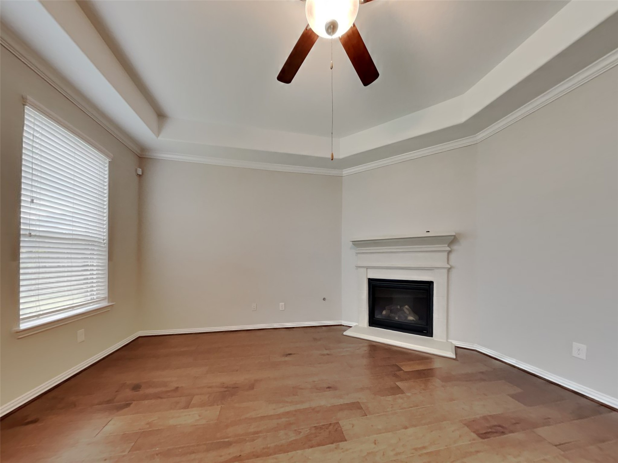 3434 Stablewood Grove Lane Spring, TX 77386 - Photo 2 of 22 an empty room with fireplace and windows