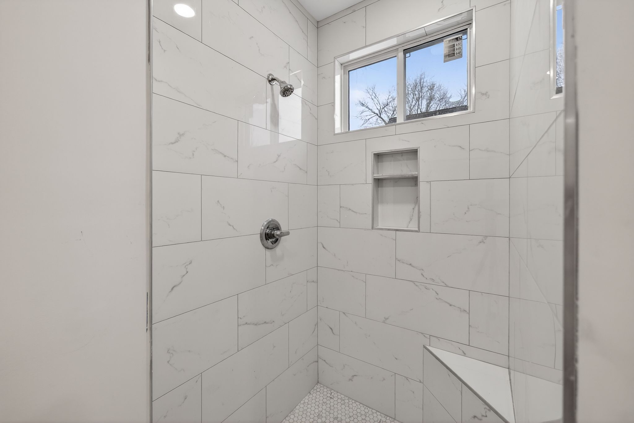 410 3rd Avenue Fayetteville, TN 37334 - Photo 27 of 49 a bathroom with mirror and a shower