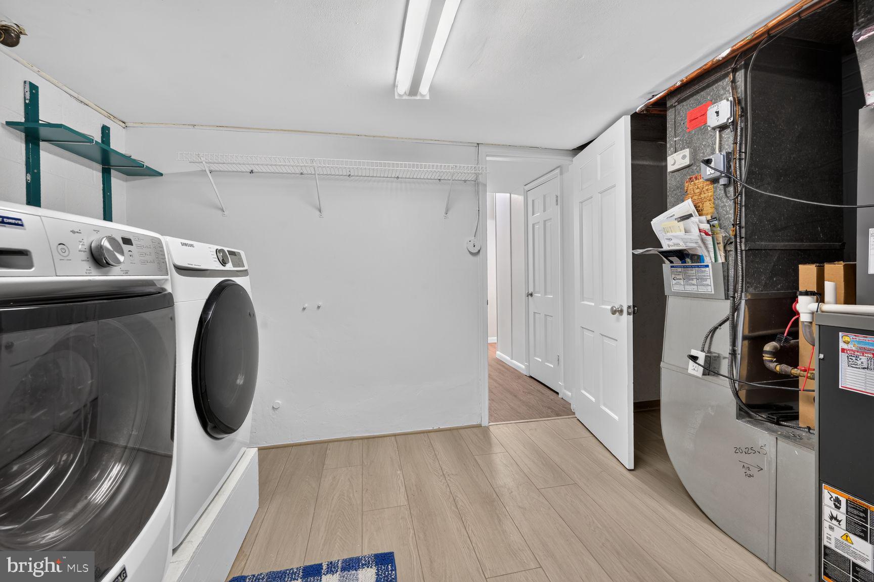 4605 Reno Road Northwest Washington, DC 20008 - Photo 46 of 49 a view of a storage & utility room with washer and dryer