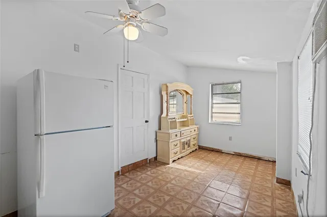 a view of a backyard with a small cabin