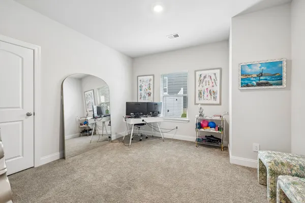 a view of livingroom with furniture and lounge chair