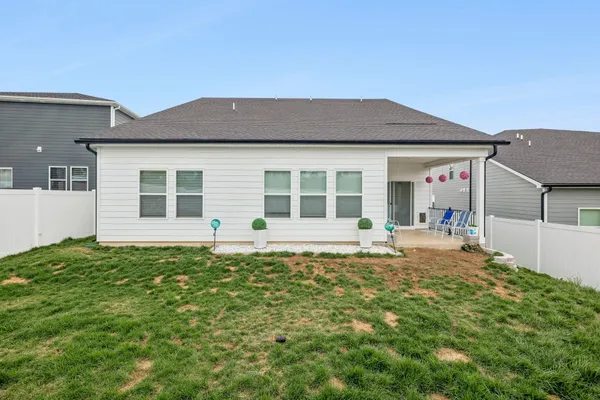 front view of a house with a yard