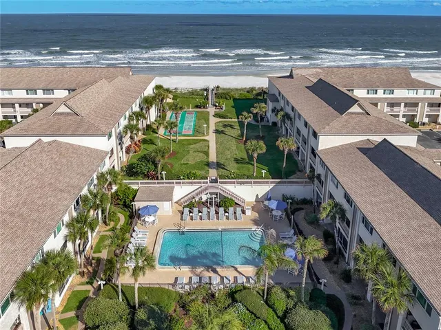 a view of a swimming pool with an outdoor space