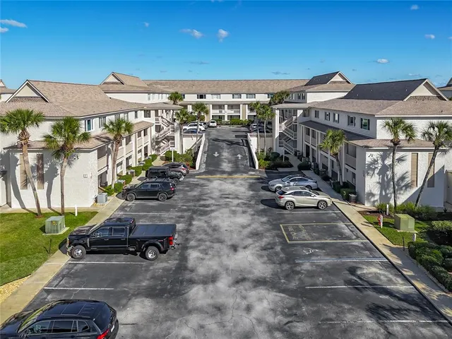 a view of a chairs and table in the patio