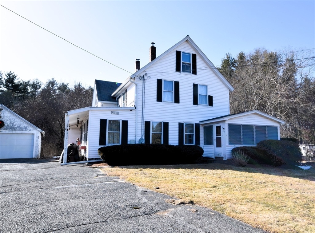 267 South Main Street Hopedale, MA 01747 - Photo 1 of 24 a front view of a house with a yard