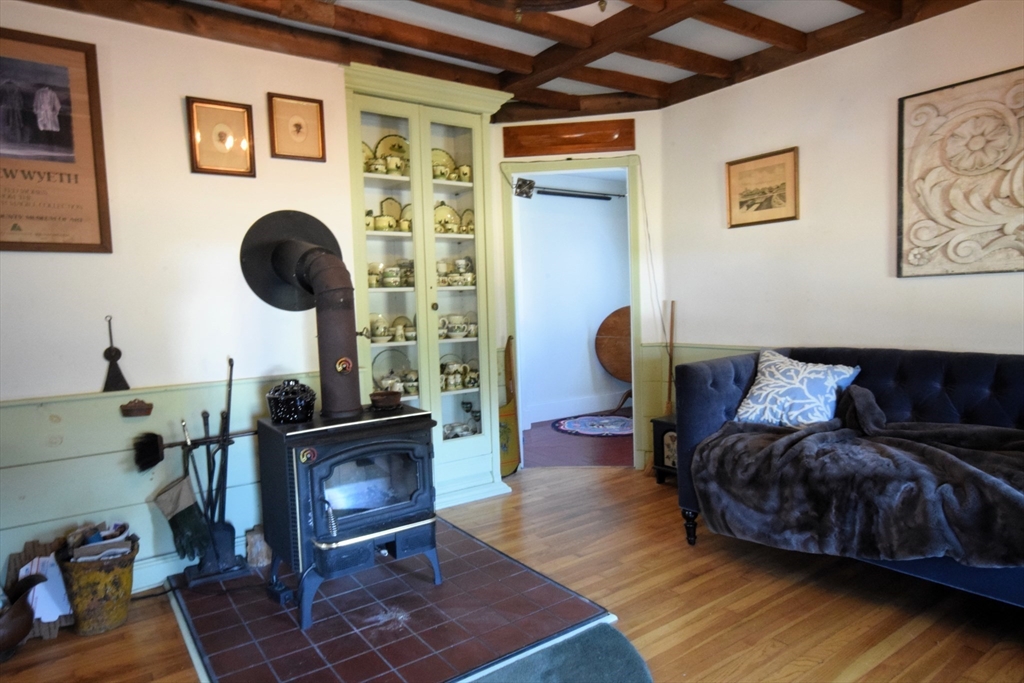 267 South Main Street Hopedale, MA 01747 - Photo 12 of 24 a living room with furniture and a wooden floor