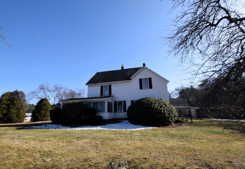 267 South Main Street Hopedale, MA 01747 - Photo 3 of 24 a front view of a house with a yard