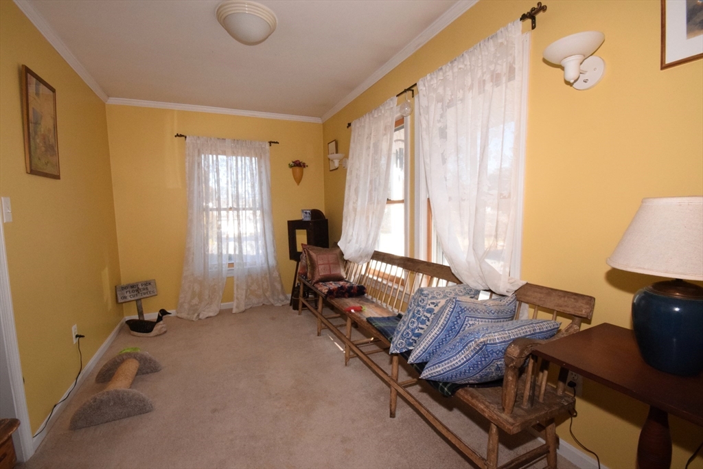 267 South Main Street Hopedale, MA 01747 - Photo 8 of 24 a bed room with a bed and a chair