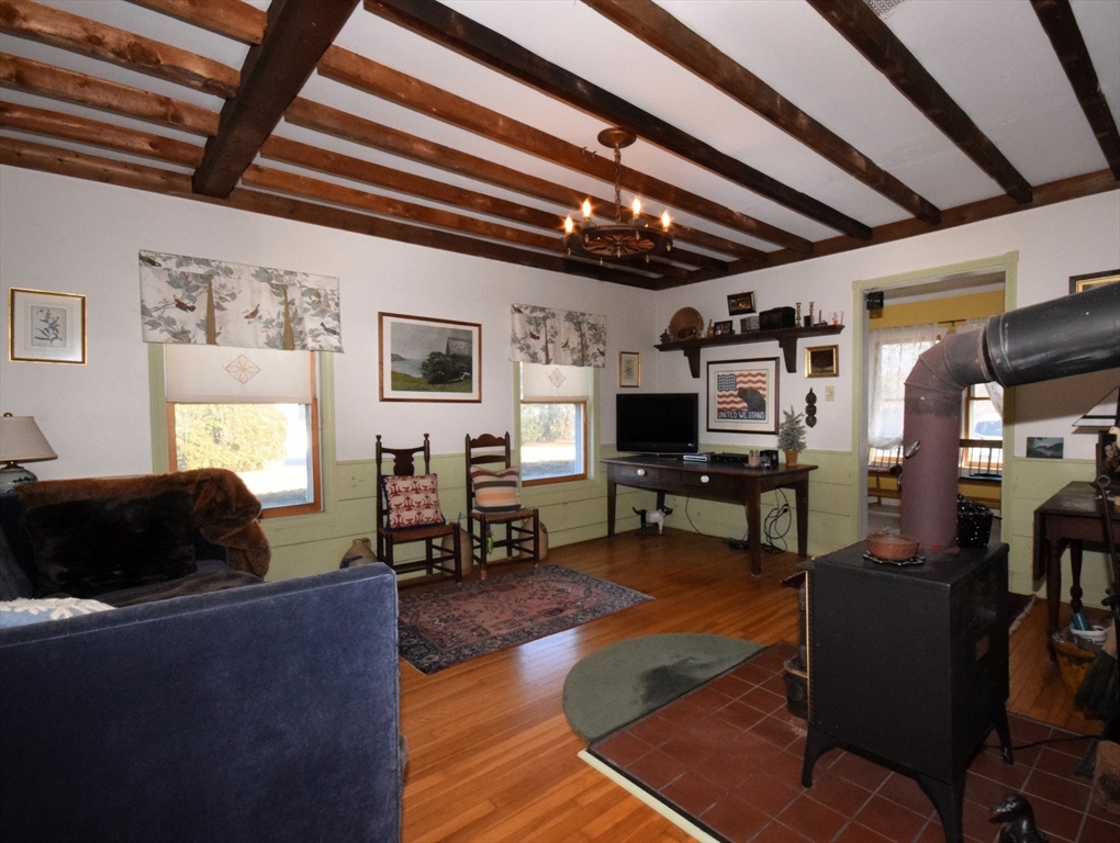 267 South Main Street Hopedale, MA 01747 - Photo 10 of 24 a living room with furniture and a flat screen tv