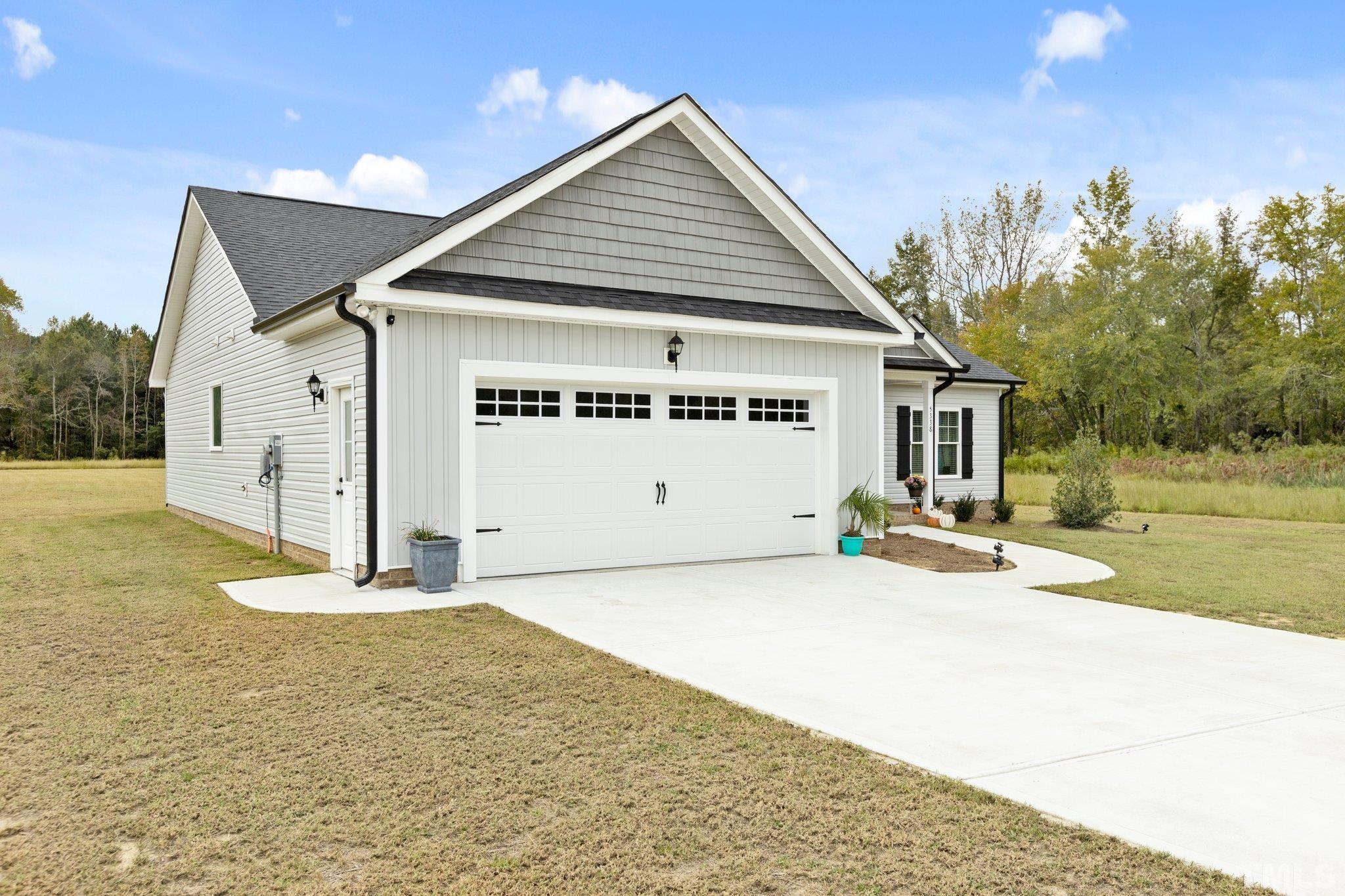 5338 Lloyd Road Lucama, NC 27851 - Photo 11 of 19 a view of a house with a patio