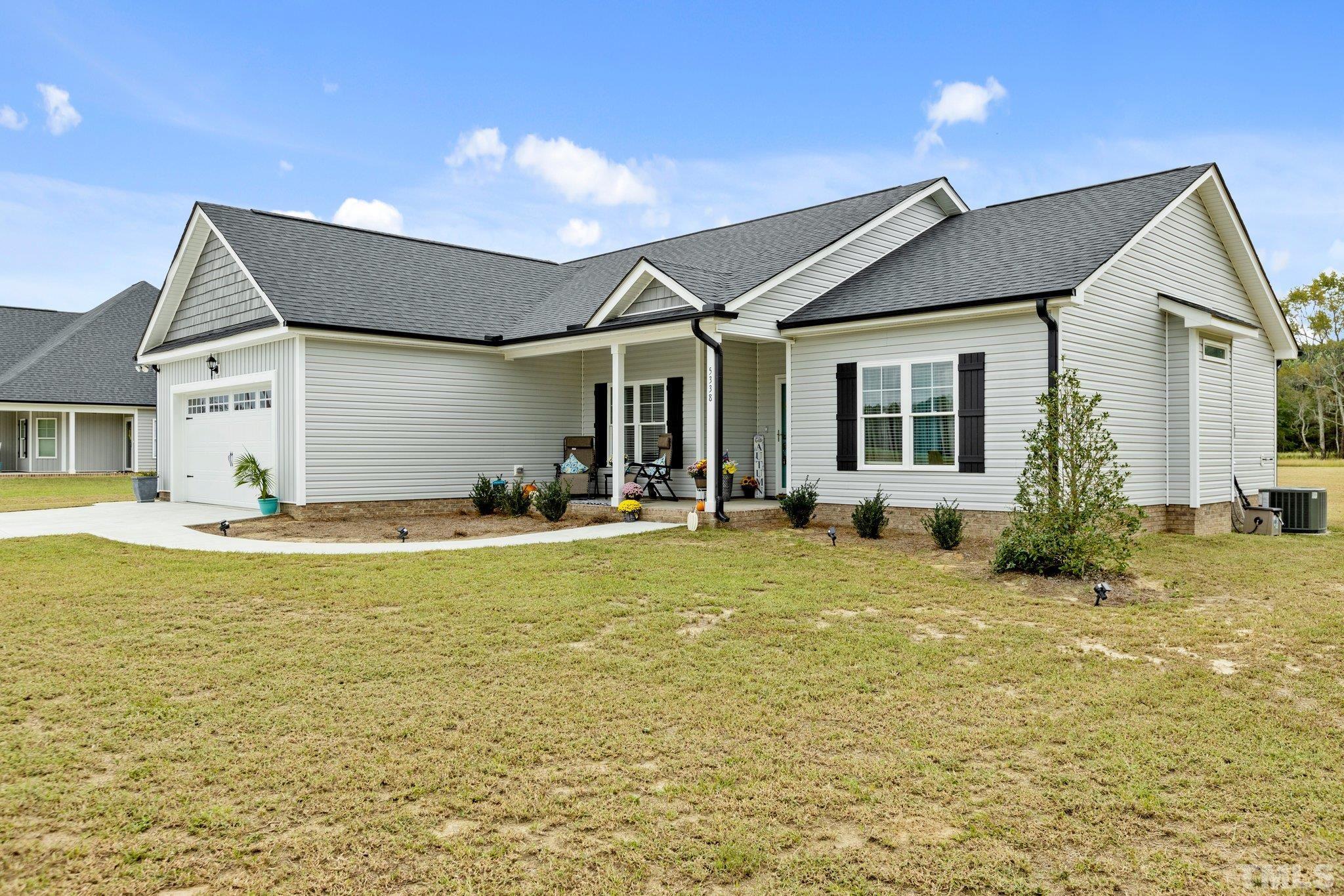 5338 Lloyd Road Lucama, NC 27851 - Photo 6 of 19 a view of swimming pool with outdoor seating