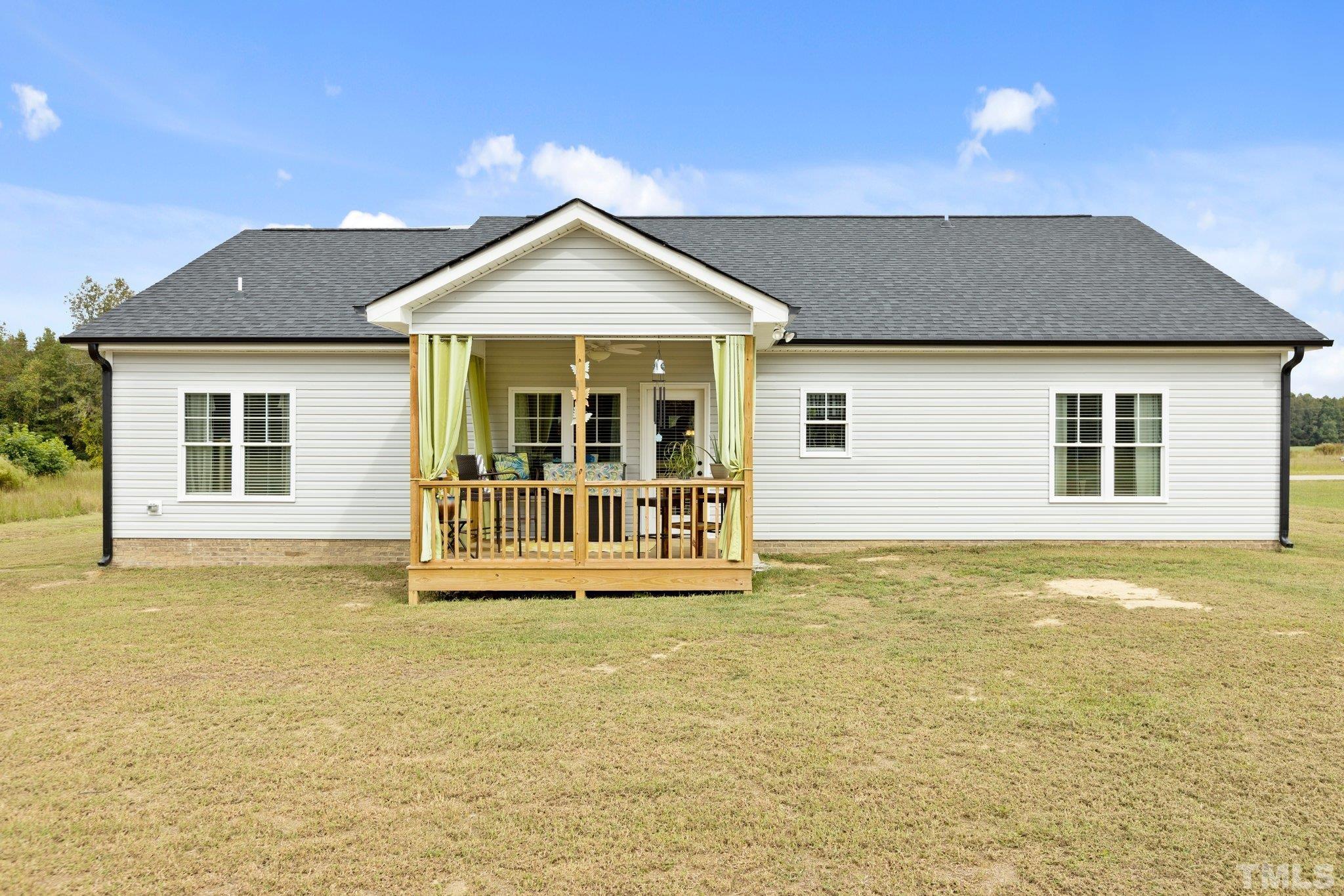 5338 Lloyd Road Lucama, NC 27851 - Photo 9 of 19 a view of a house with a swimming pool