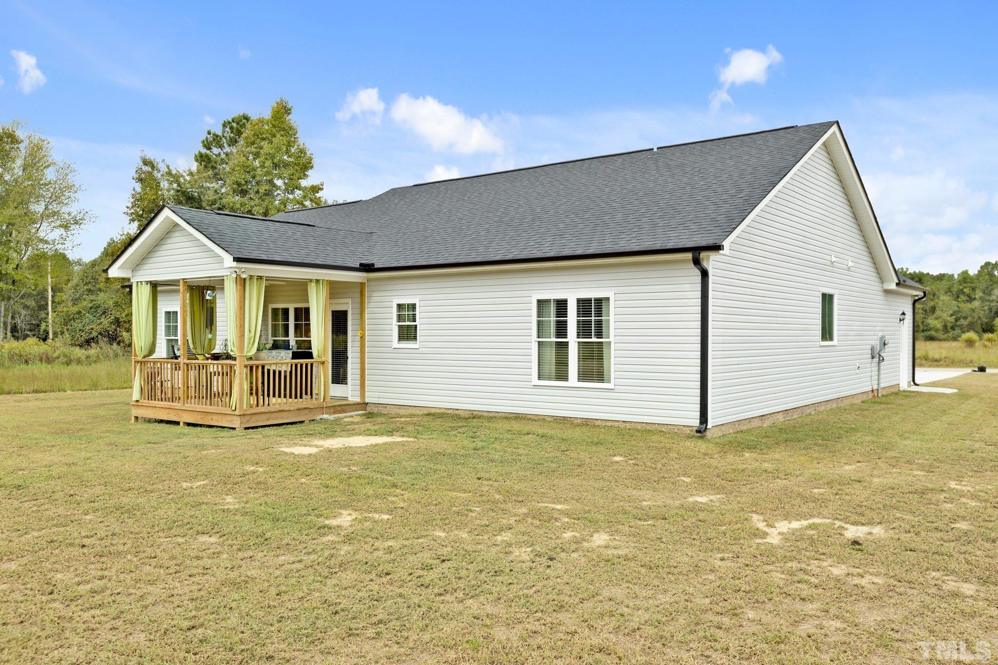 5338 Lloyd Road Lucama, NC 27851 - Photo 10 of 19 a view of a house with a swimming pool