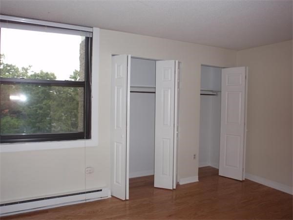 45 Trowbridge Street, Unit 5C Cambridge, MA 02138 - Photo 6 of 8 a view of a room that has a large window