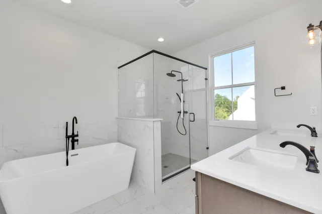 a bathroom with a sink and a bathtub