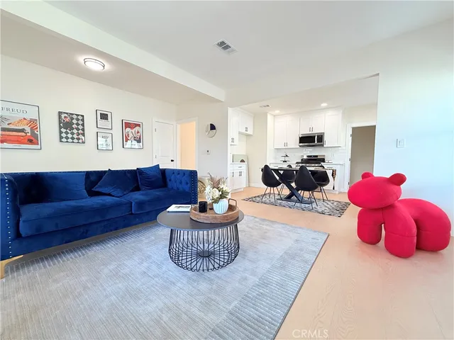 a living room with furniture and a couch