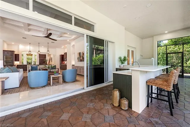 a room with wooden floor and furniture