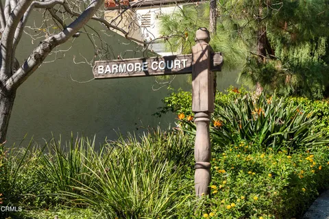 a sign that is on a tree