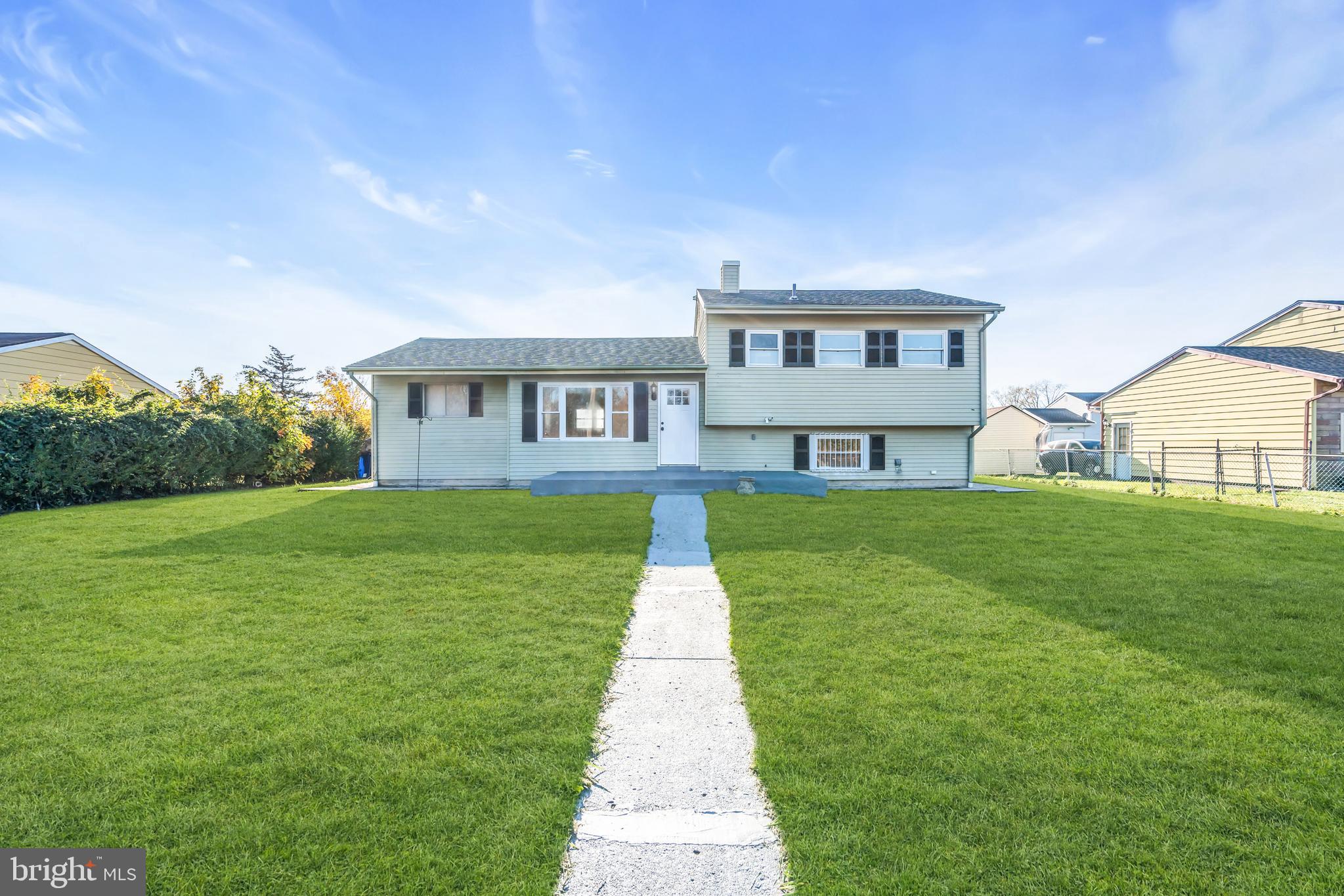 a front view of house with yard