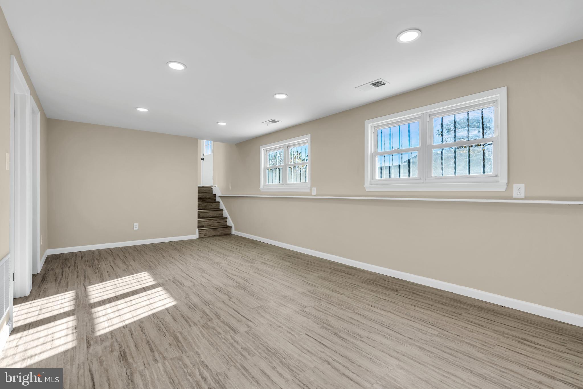 86 Scrapetown Road Pemberton, NJ 08068 - Photo 14 of 43 a view of empty room with wooden floor and fan