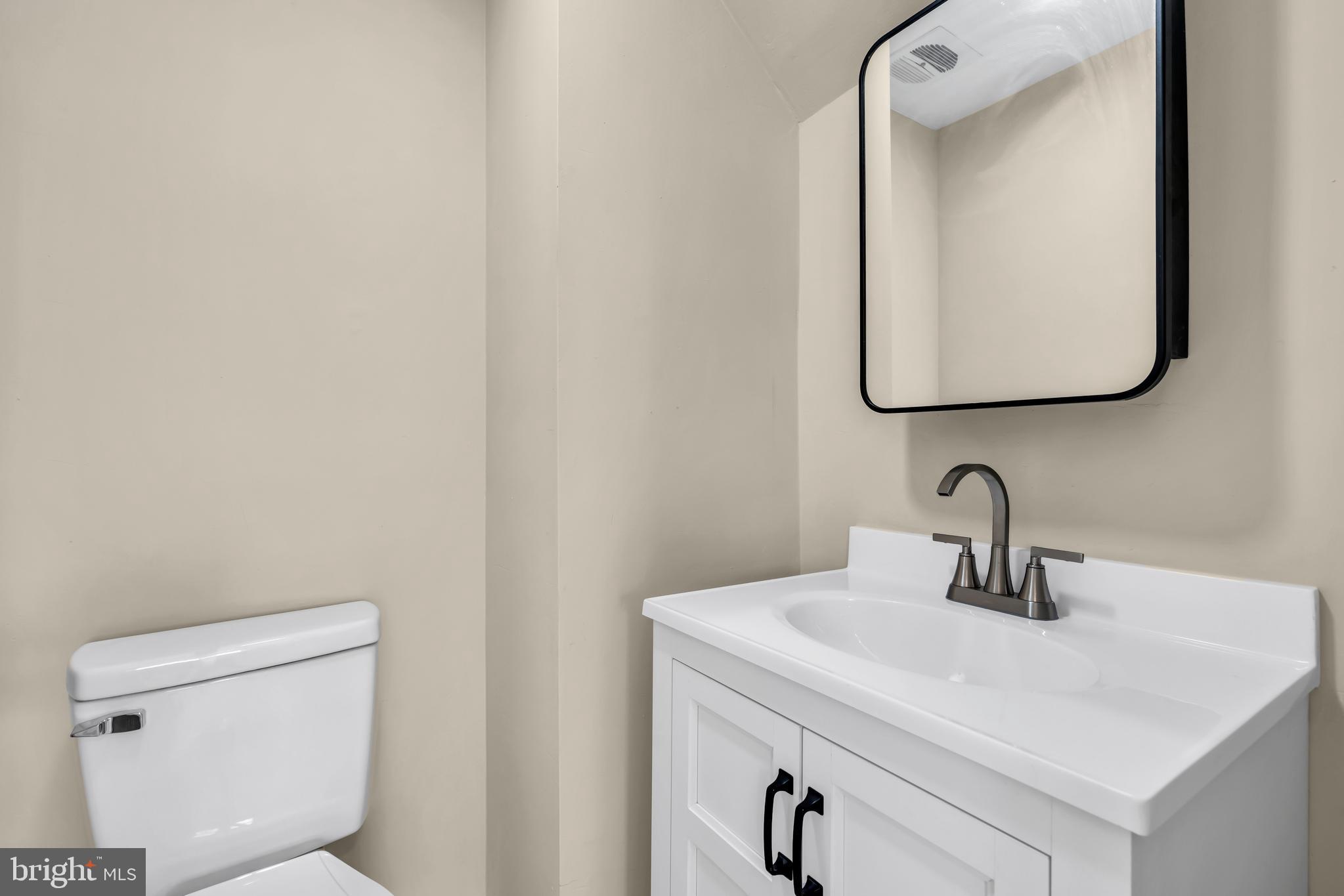 86 Scrapetown Road Pemberton, NJ 08068 - Photo 17 of 43 a bathroom with a toilet sink and mirror