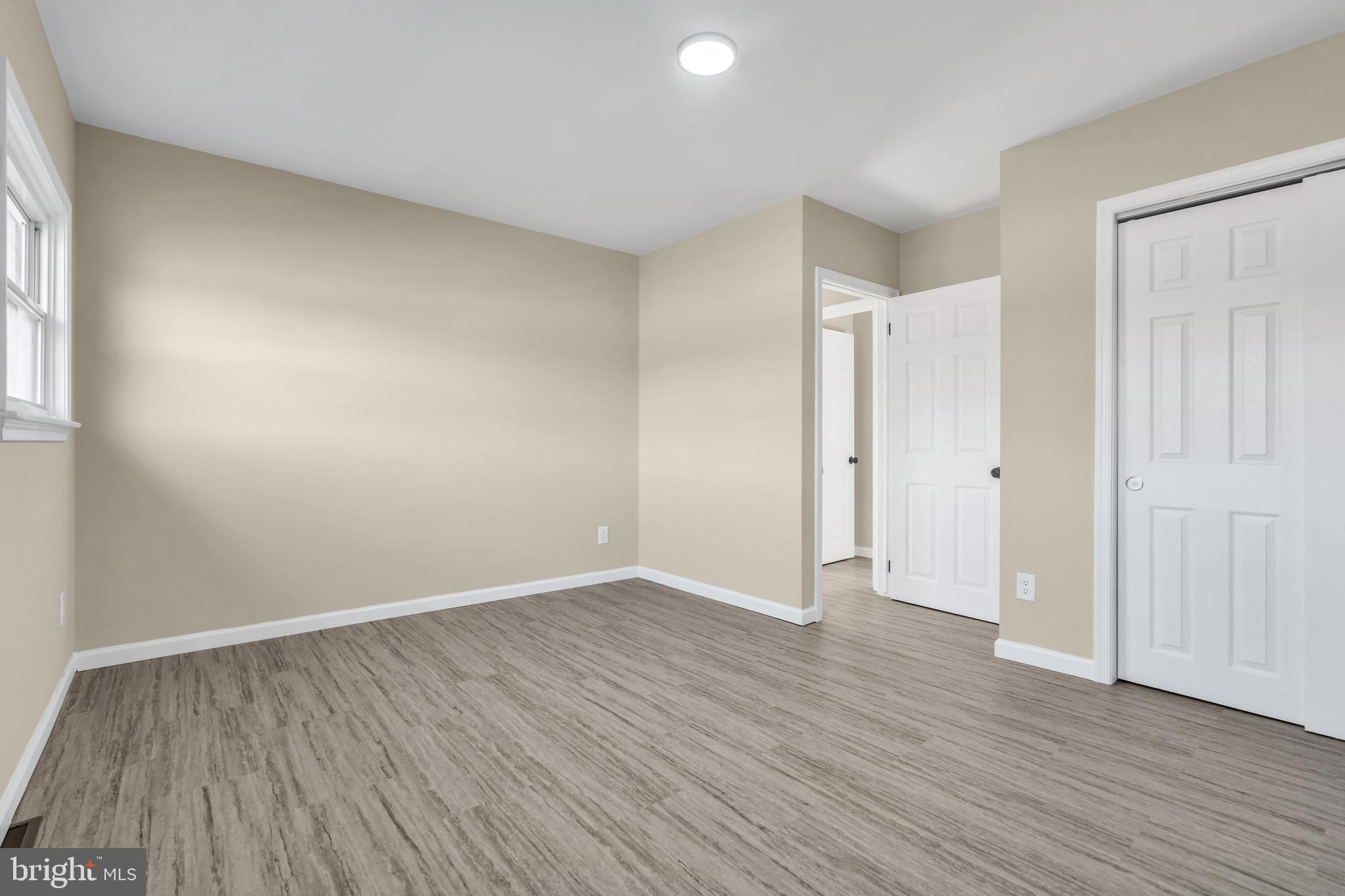 86 Scrapetown Road Pemberton, NJ 08068 - Photo 24 of 43 a view of an empty room with wooden floor