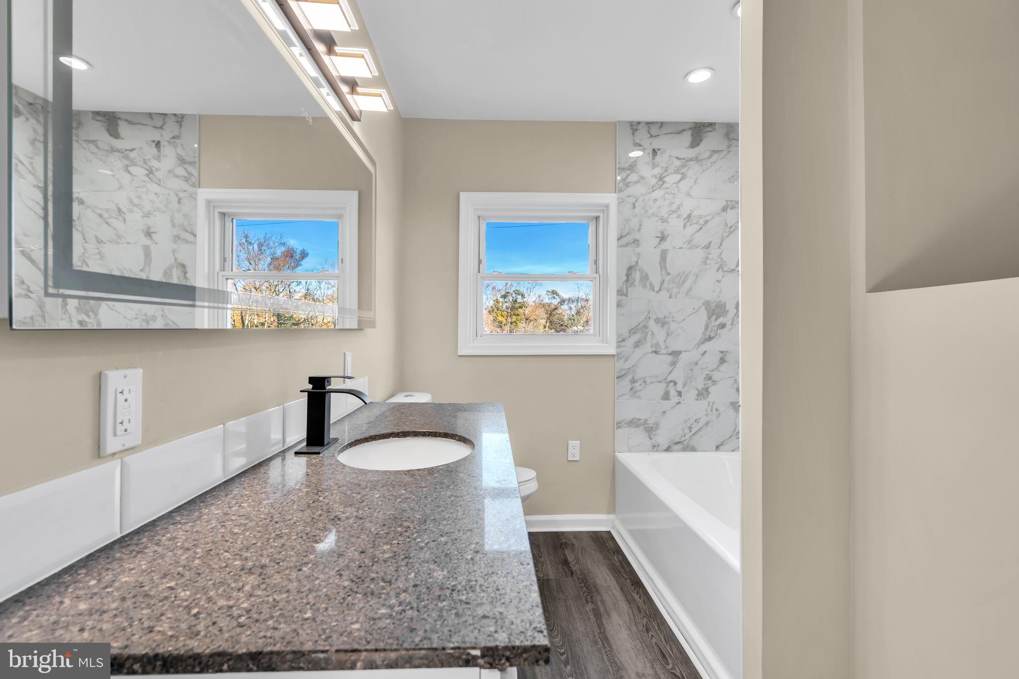 86 Scrapetown Road Pemberton, NJ 08068 - Photo 25 of 43 a bathroom with a bathtub and shower