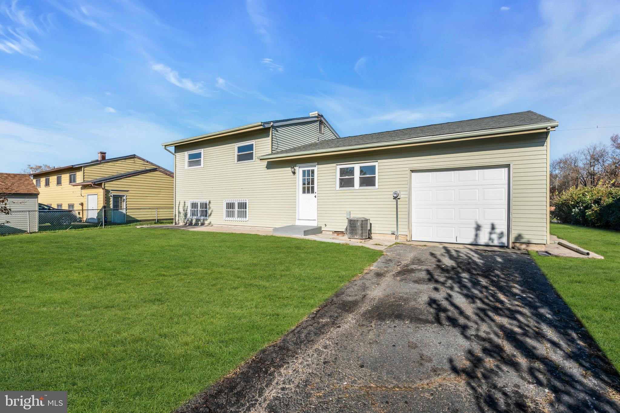 86 Scrapetown Road Pemberton, NJ 08068 - Photo 40 of 43 a view of a white house with a yard