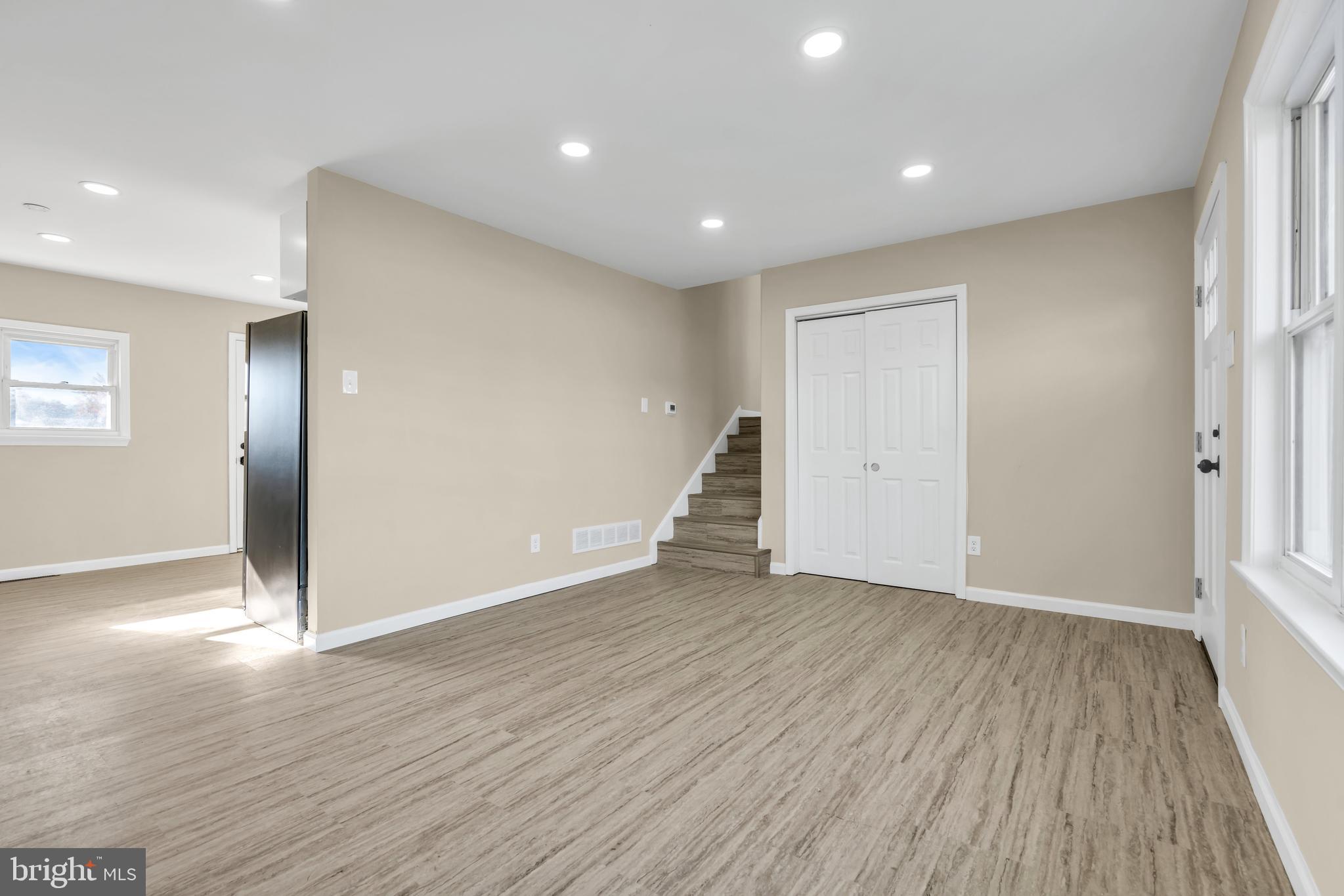 86 Scrapetown Road Pemberton, NJ 08068 - Photo 8 of 43 an empty room with wooden floor and windows