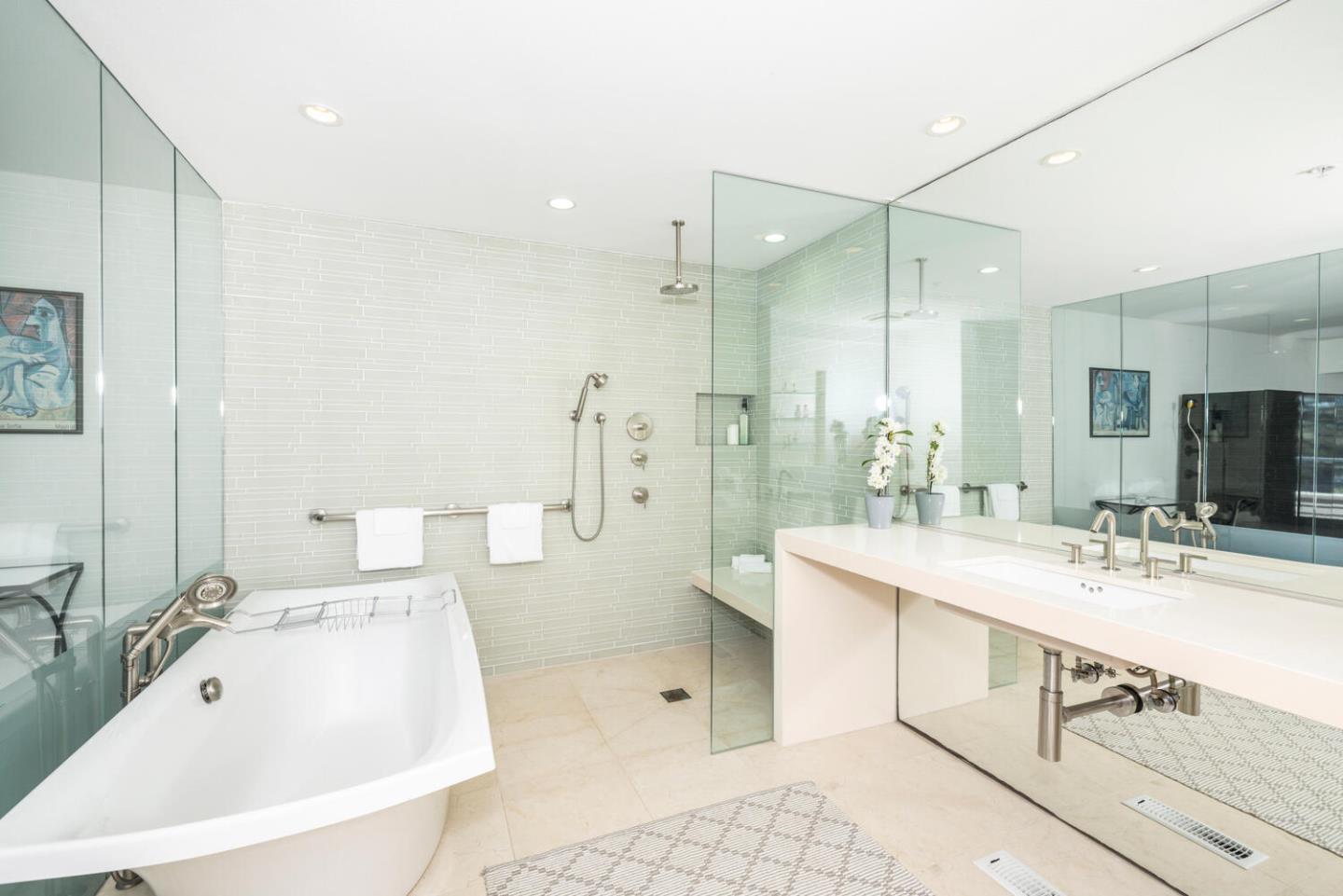 211 Roberts Road Pacifica, CA 94044 - Photo 12 of 42 a spacious bathroom with a bathtub shower sink double and mirror