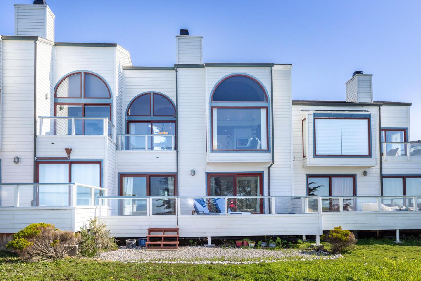 211 Roberts Road Pacifica, CA 94044 - Photo 13 of 42 a building view with couches in front of it