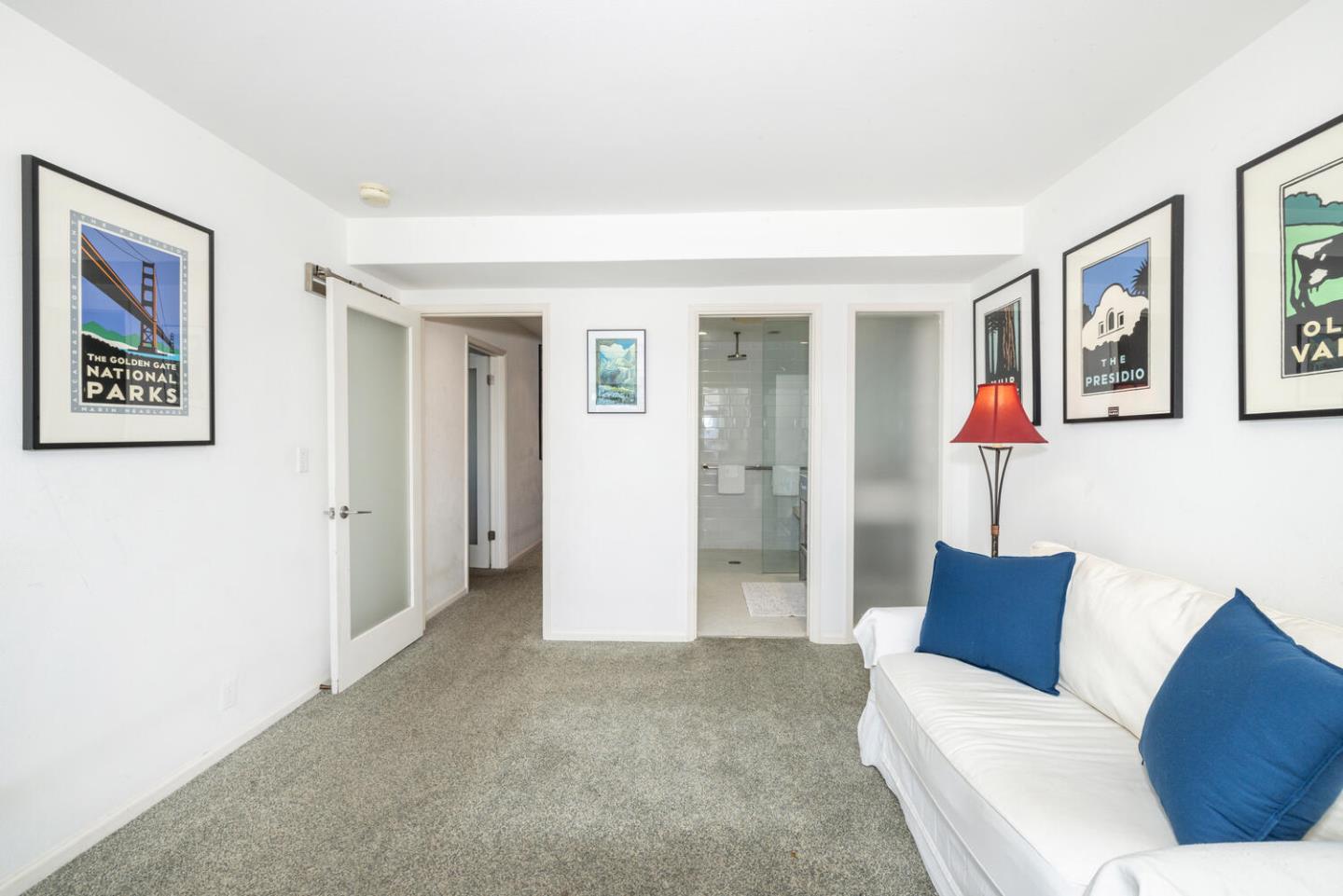 211 Roberts Road Pacifica, CA 94044 - Photo 17 of 42 a living room with furniture and a view of bathroom