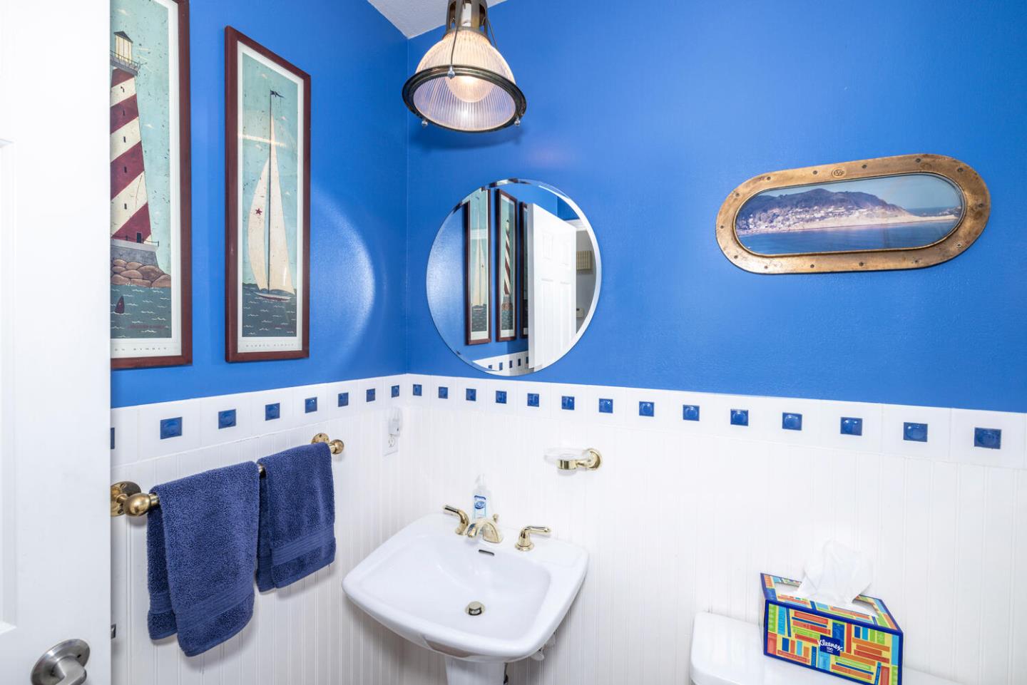 211 Roberts Road Pacifica, CA 94044 - Photo 26 of 42 a bathroom with a sink and a mirror