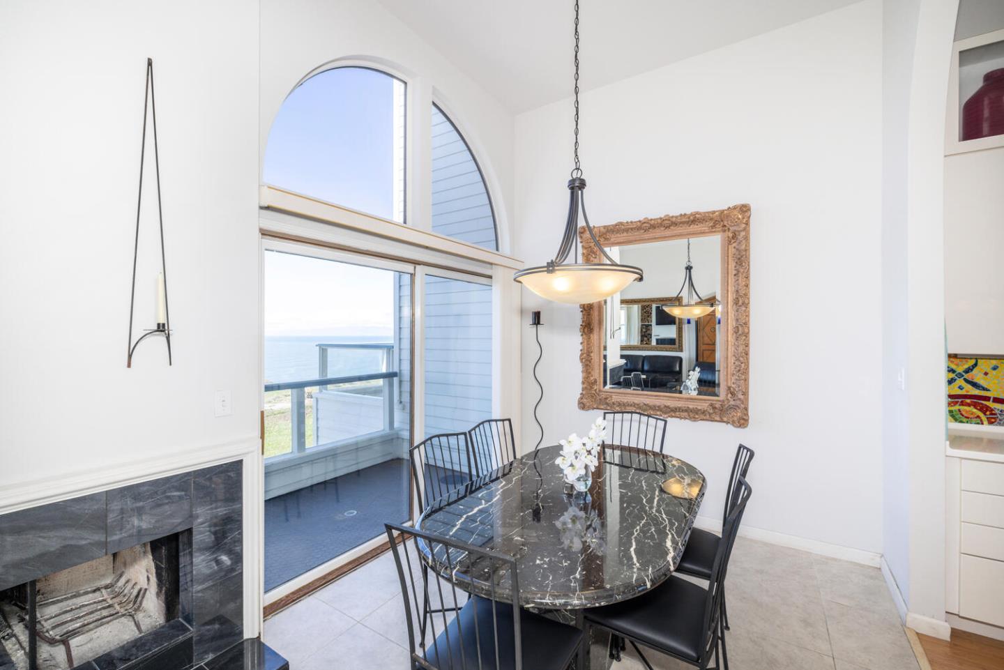 211 Roberts Road Pacifica, CA 94044 - Photo 29 of 42 a view of a dining room with furniture window and wooden floor