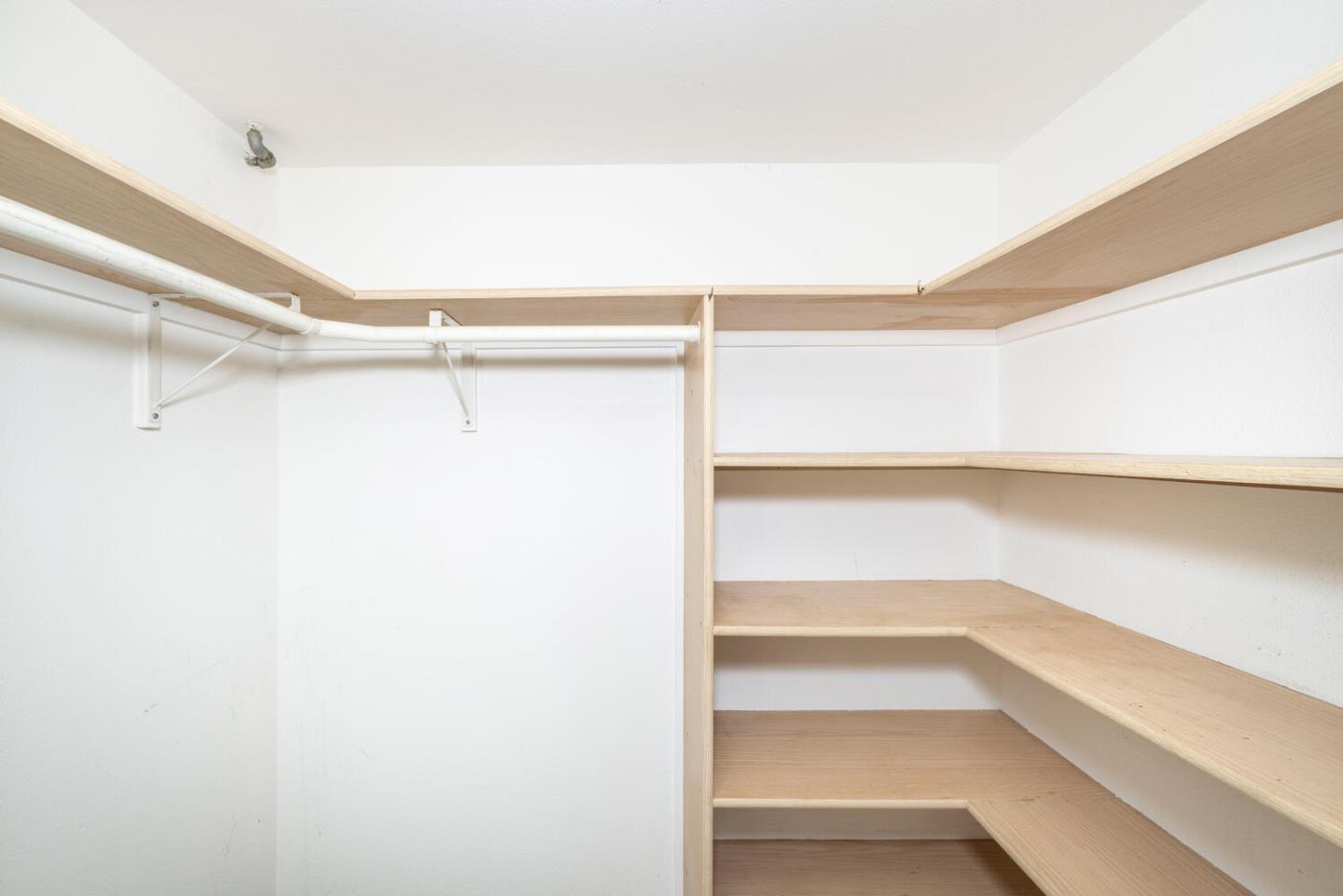 211 Roberts Road Pacifica, CA 94044 - Photo 40 of 42 a view of an empty walk in closet