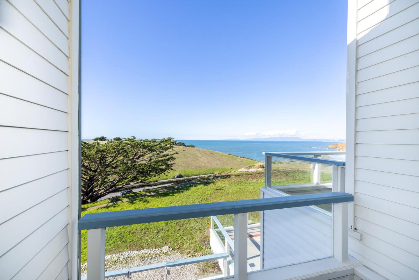 211 Roberts Road Pacifica, CA 94044 - Photo 5 of 42 a view of a balcony with an outdoor space