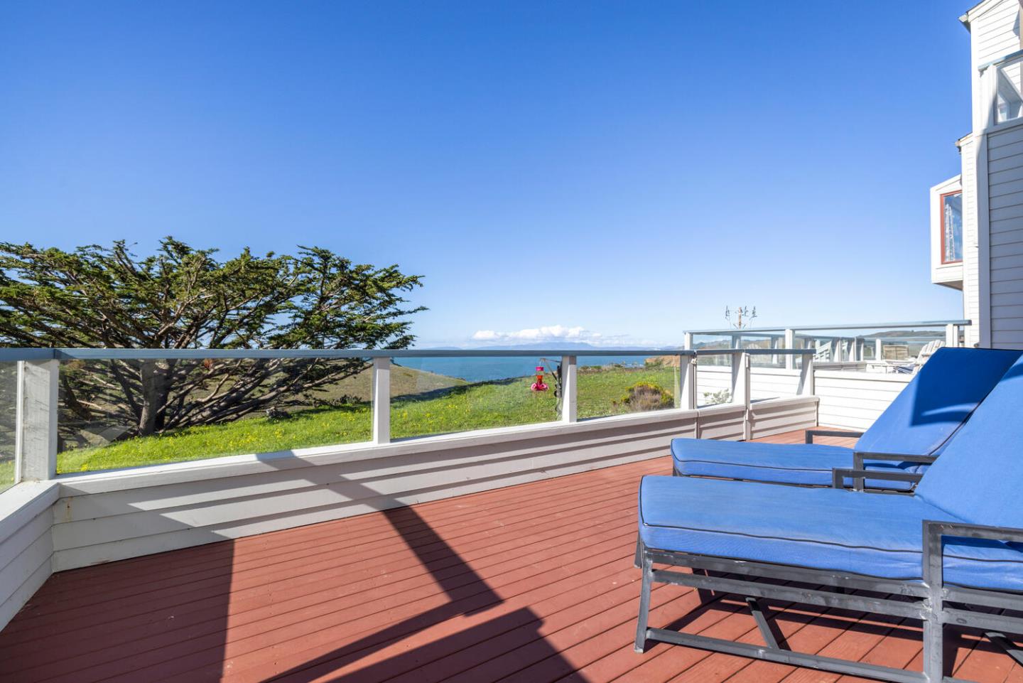 211 Roberts Road Pacifica, CA 94044 - Photo 6 of 42 a view of a patio with wooden floor