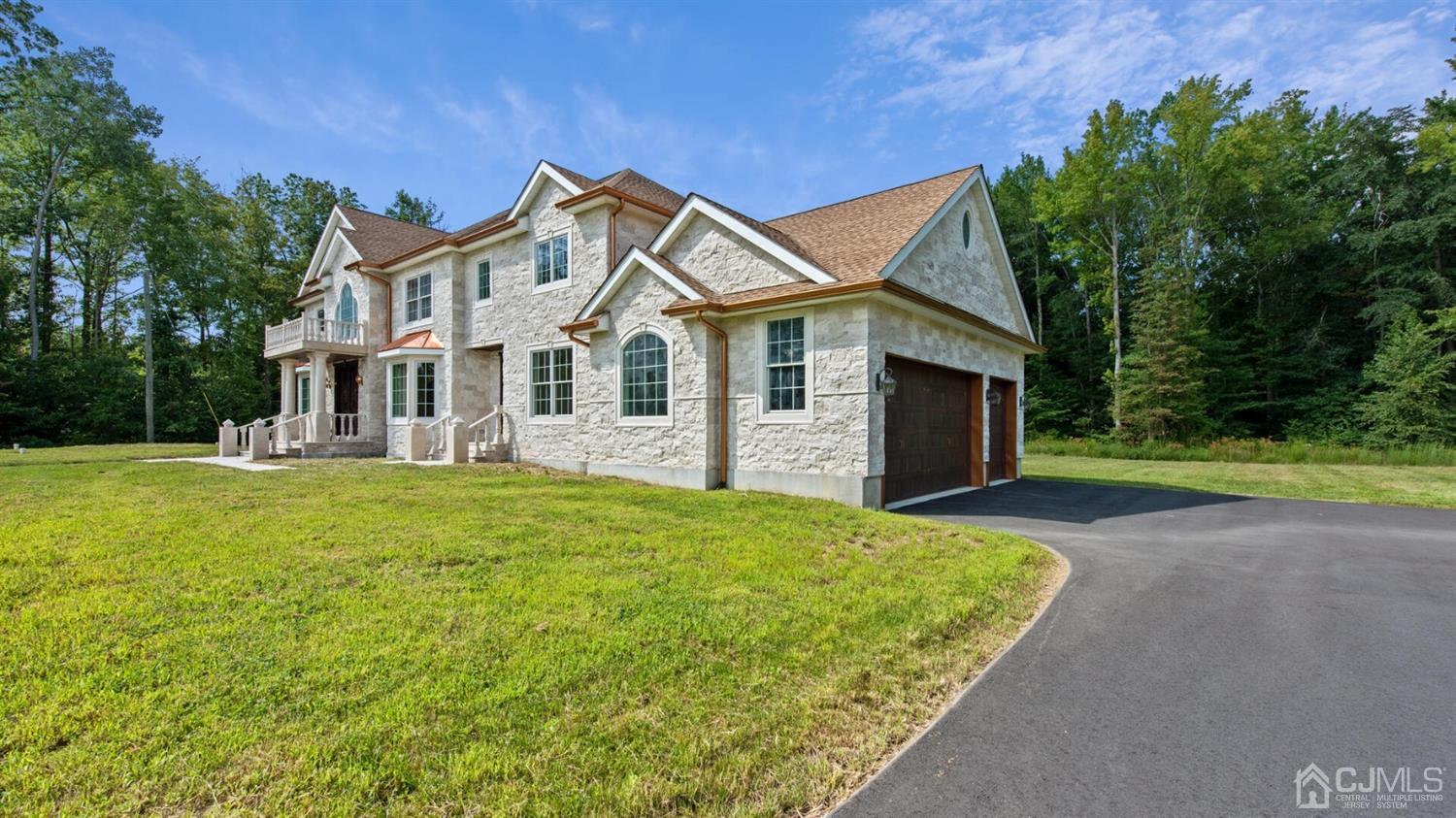 152 Culver Road Monmouth Junction, NJ 08852 - Photo 2 of 87 a front view of a house with yard and green space